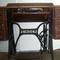 1857 Singer Treadle Machine w/ access.