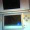 Nintendo DS Lite and Two Games for Ipod Touch